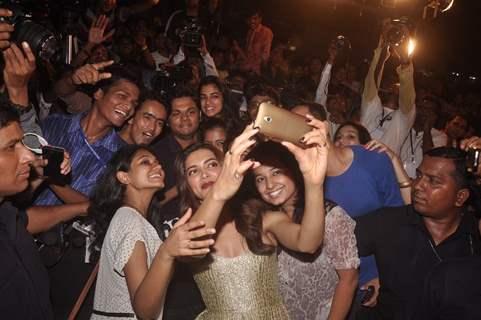 Deepika Padukone clicks a selfie with the people of the media at the 16th MAMI Film Festival