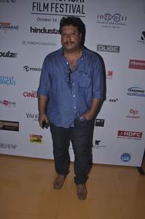 Tigmanshu Dhulia poses for the media at the 16th MAMI Film Festival Day 3