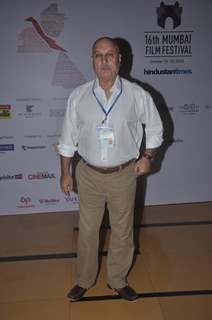 Anupam Kher poses for the media at the 16th MAMI Film Festival Day 3
