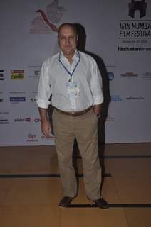 Anupam Kher poses for the media at the 16th MAMI Film Festival Day 3