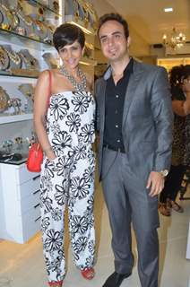 Mandira Bedi poses with a guest at the Minerali Store Launch