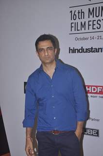 Sanjay Suri poses for the media at the 16th MAMI Film Festival Day 5