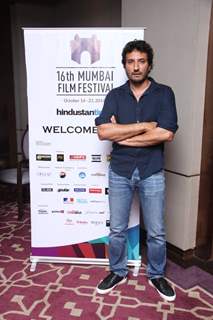 Homi Adajania poses for the media at the 16th MAMI Film Festival