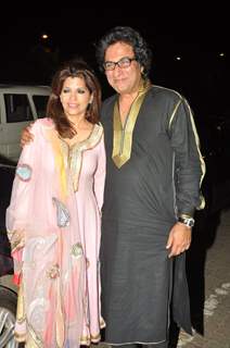 Talat and Bina Aziz pose for the media at Vardan Aashirwad House Party