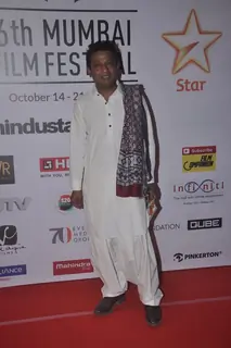 Onir poses for the media at the Closing Ceremony of 16th MAMI Film Festival