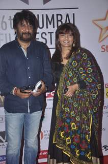 Pallavi Joshi poses with her husband at the Closing Ceremony of 16th MAMI Film Festival