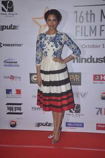 Esha Gupta poses for the media at the Closing Ceremony of 16th MAMI Film Festival