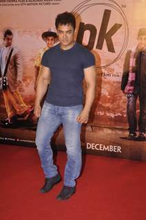 Aamir Khan poses for the media at the Teaser Trailer Launch of P.K.