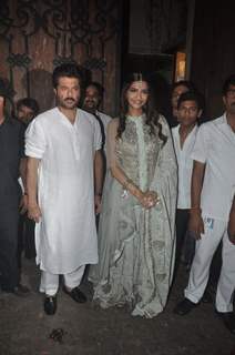 Anil Kapoor and Sonam Kapoor pose for the media during Diwali Celebration