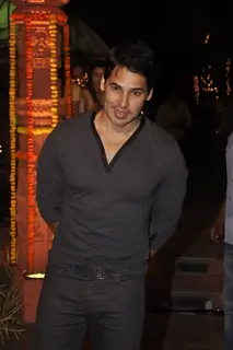 Dino Morea poses for the media at Sachin Joshi's Diwali Bash