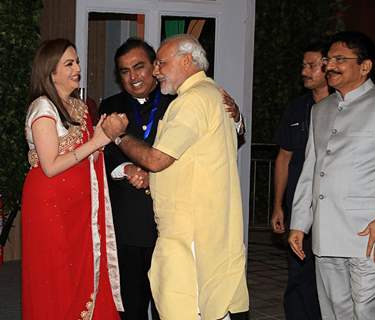 Narendra Modi greets Nita and Mukesh Ambani at the Launch of HN Reliance Foundation Hospital
