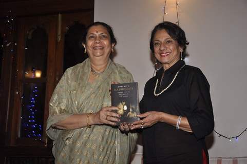 Tanuja poses with Bimal Roy's Book at the Launch