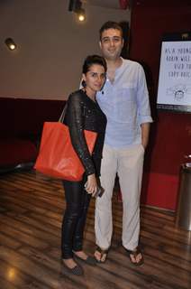 Shruti Seth poses with her husband at the Premier of the Film Interstellar