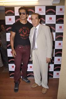 Sonu Sood poses with Nari Hira at the Launch of the New Edition of Stardust Rising