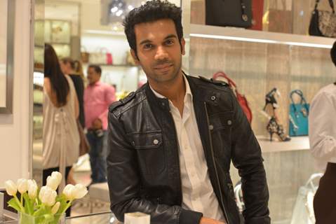 Rajkummar Rao poses for the media at Michael Korrs Store Launch