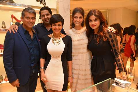 Celebs pose for the media at Michael Korrs Store Launch