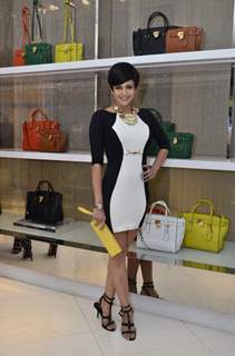 Mandira Bedi poses for the media at Michael Korrs Store Launch