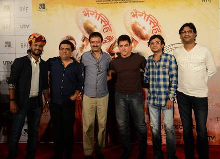 Team of P.K. poses for the media at the Song Launch
