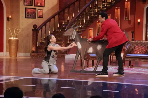 Kalki Koechlin and Govinda perform an act on Comedy Nights With Kapil