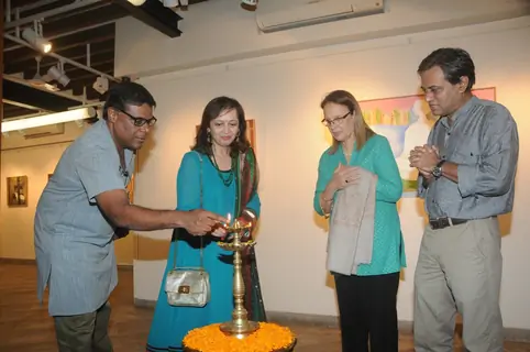 Ashish Vidyarthi lights the lamp at the Inauguration of a Special Art Exhibition