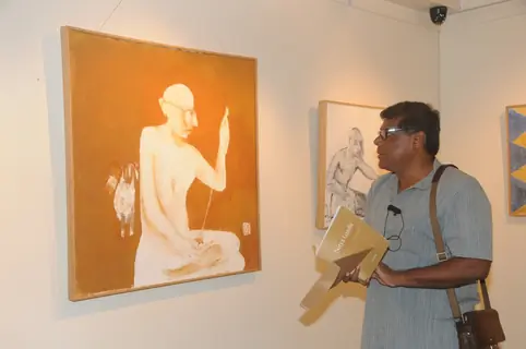 Ashish Vidyarthi checks out the art work at the Inauguration of a Special Art Exhibition