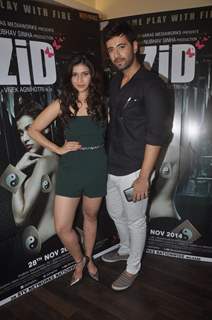 Mannara Chopra and Karanvir Sharma pose for the camera at the Media Interactions of the Movie 'ZID'