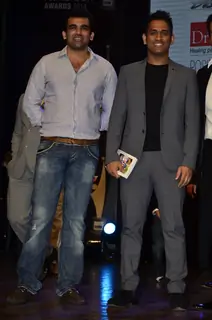 MS Dhoni and Zaheer Khan pose for the media at Positive Health Awards
