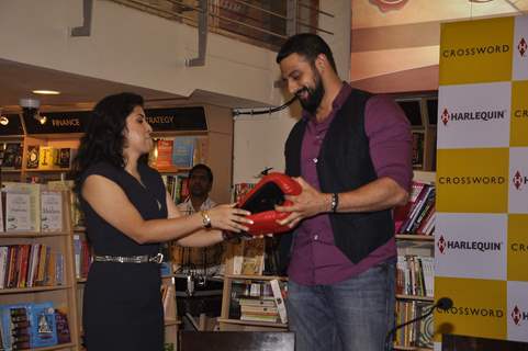 Nidhie Sharma snapped giving boxing gloves to Arunoday Singh at her Book Launch