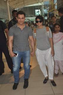 Aamir Khan and Kiran Rao snapped at airport while returning from Arpita Khan's Wedding