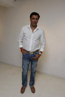 Madhur Bhandarkar poses for the media at the Book Launch of Sandeep Unnithan's Black Tornado