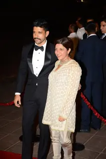 Farhan Akhtar and Zoya Akhtar pose for the media at Arpita Khan's Wedding Reception