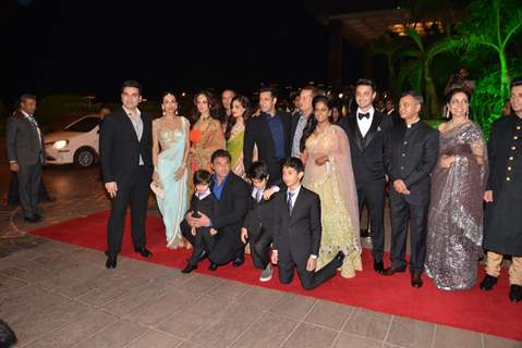 The Khan Family poses with the newly wedded Couple at the Reception