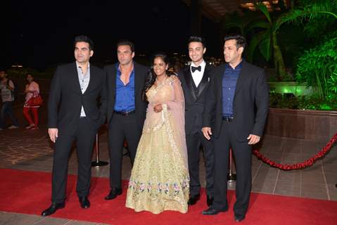 Arpita and Aayush pose with the Khan Brothers at their Wedding Reception