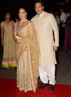 Lara Dutta and Mahesh Bhupathi pose for the media at Arpita Khan's Wedding Reception