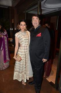 Karisma Kapoor poses with Father Randhir Kapoor at Arpita Khan's Wedding Reception