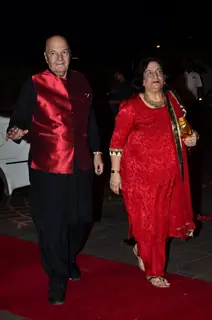 Prem Chopra with wife Uma pose for the media at Arpita Khan's Wedding Reception