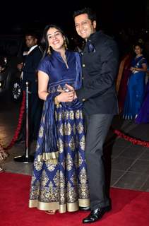 Riteish Deshmukh and Genelia pose for the media at Arpita Khan's Wedding Reception