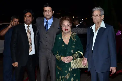 Armaan Kohli poses with his Parents at Arpita Khan's Wedding Reception