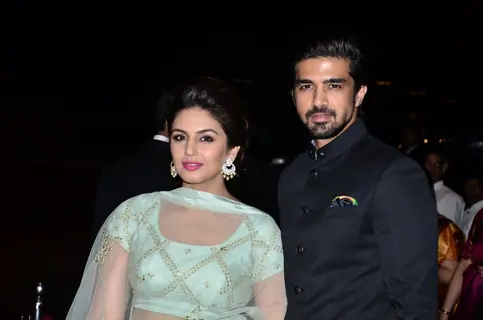 Huma Qureshi and Saqib Saleem pose for the media at Arpita Khan's Wedding Reception