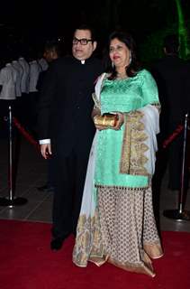 Ramesh Taurani poses with wife at Arpita Khan's Wedding Reception