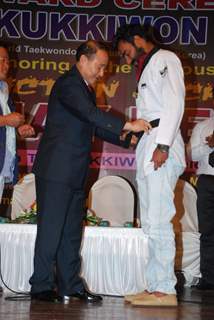 Ajay Devgn felicitated with a black belt by Taekwondo Masters from Korea