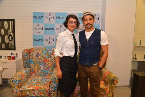 Farhan Akhtar and Adhuna Akhtar pose for the media at the Launch of BBlunt Salon