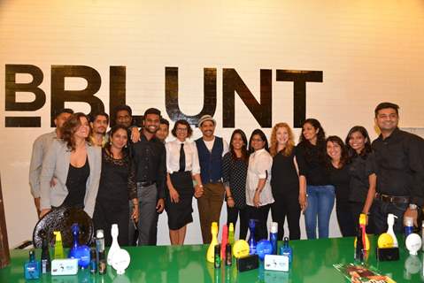 Farhan Akhtar and Adhuna Akhtar pose with the staff at the Launch of BBlunt Salon