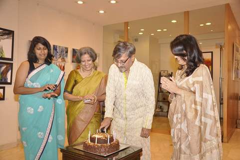 Amol Palekar cuts a cake at his Art Exhibition