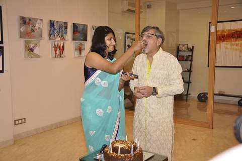 Amol Palekar's daughter feeds him cake at his Art Exhibition