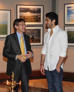 Mohit Marwah in conversation with a guest at Mongolia Day, An Art Exhibition by Shantanu Das