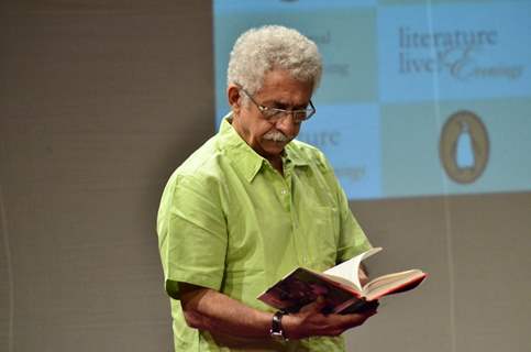 Naseeruddin Shah was snapped browsing through his book at the Launch