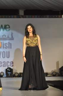 Sneha Wagh walks the ramp at Wellingkar's 26/11 Tribute