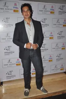 Dino Morea poses for the media at Sahil Mane's 'Why A Stray' Calendar Launch