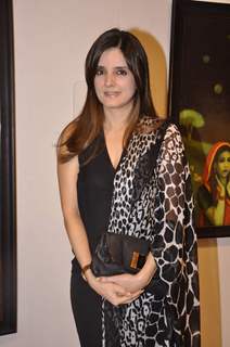 Simone Khan poses for the media at Camel Colors Exhibition